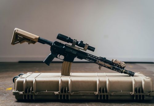 Rifle Sitting On Top Of Rifle Case